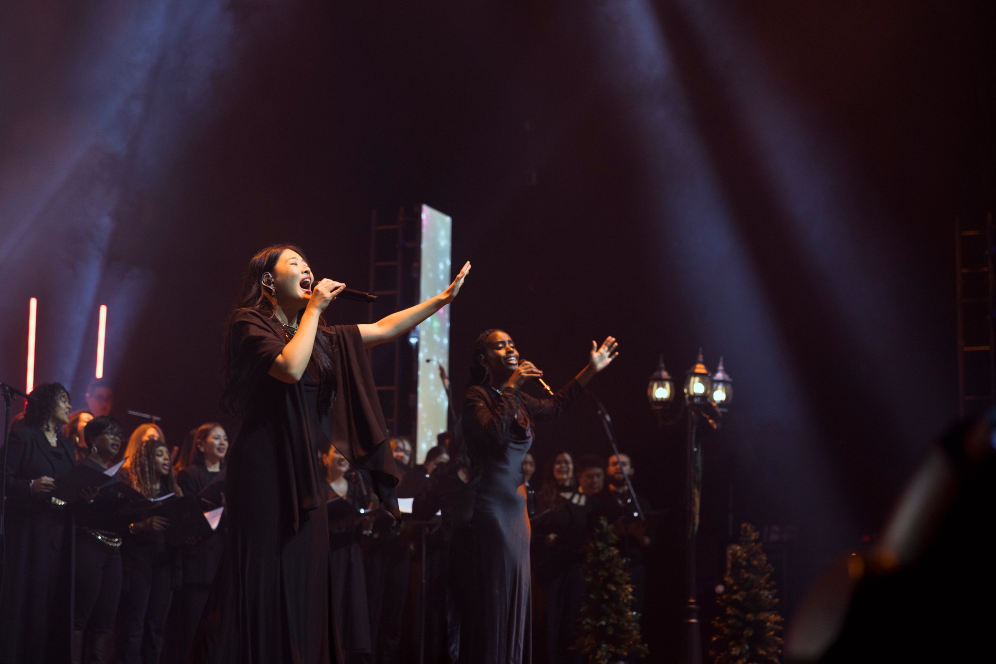 Choir and worship group performing at a special ministry event